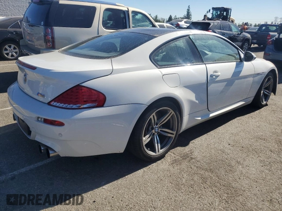 2010 BMW M6 z VIN WBSEH9C52ACY25220, wystawiony jako Copart lot #80767324 z przebiegiem Nie podano mil oraz Szkoda całkowita • Salvage title. Historia ofert i sprzedaży dostępna na DreamBid. Obrazek 3.
