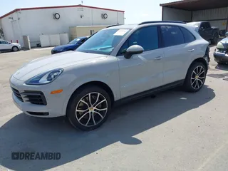 2021 Porsche Cayenne z VIN WP1AA2AY2MDA02749, wystawiony jako IAAI lot #41944514 z przebiegiem 97 493 mil mil oraz . Historia ofert i sprzedaży dostępna na DreamBid. Obrazek 2.