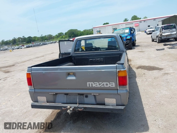 1992 Mazda B-Series Truck with VIN JM2UF313XN0306779, listed as a IAAI auction lot 42104583 with 137,826 mi miles and . Bid and sale history available at DreamBid. Image 16.