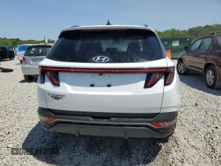 2022 Hyundai Tucson SEL with VIN 5NMJF3AE2NH005982, listed as a Copart auction lot 52438945 with 52,636 mi miles and Salvage Title. Bid and sale history available at DreamBid. Image 6.