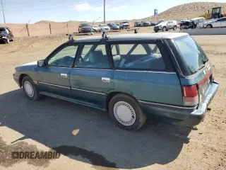 1994 Subaru Legacy L with VIN 4S3BJ6337R7955431, listed as a Copart auction lot 70200794 with 281,694 mi miles and Salvage Title. Bid and sale history available at DreamBid. Image 2.