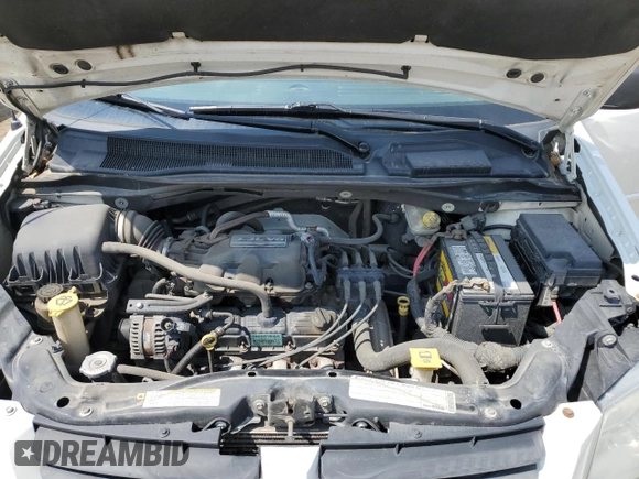 2009 Dodge Grand Caravan with VIN 1D8HN11E99B505784, listed as a Copart auction lot 60590065 with 195,488 mi miles and Salvage title. Bid and sale history available at DreamBid. Image 12.