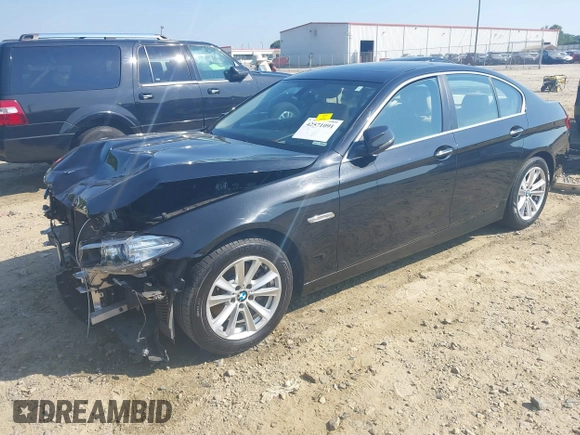 2015 BMW 5 Series 528i with VIN WBA5A5C52FD518794, listed as a IAAI auction lot 42571091 with 165,744 mi miles and . Bid and sale history available at DreamBid. Image 2.