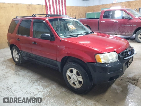 2003 Ford Escape XLT Popular 2 with VIN 1FMYU93103KB33975, listed as a Copart auction lot 70219724 with 182,037 mi miles and Clean Title. Bid and sale history available at carsss.com. Image 4.