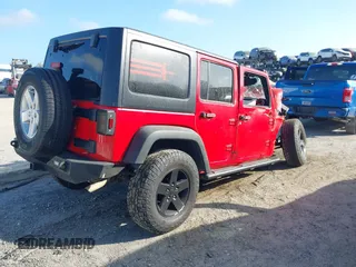 2015 Jeep Wrangler Unlimited Sport with VIN 1C4BJWDG4FL694005, listed as a IAAI auction lot 41971529 with Not provided miles and . Bid and sale history available at DreamBid. Image 4.