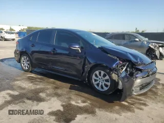2023 Toyota Corolla LE with VIN 5YFB4MDE3PP006014, listed as a Copart auction lot 52708825 with 42,322 mi miles and Non Repairable. Bid and sale history available at DreamBid. Image 4.