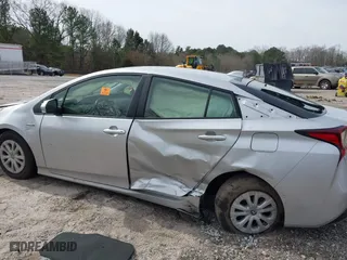 2021 Toyota Prius L Eco with VIN JTDKAMFU1M3152848, listed as a IAAI auction lot 41600212 with 140,114 mi miles. Bid and sale history available at carsss.com. Image 6.