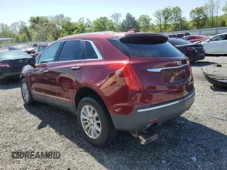 2018 Cadillac XT5 FWD with VIN 1GYKNARS1JZ205595, listed as a Copart auction lot 52428565 with 106,927 mi miles and Salvage title. Bid and sale history available at DreamBid. Image 2.