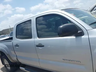 2006 Toyota Tacoma PreRunner z VIN 3TMKU72N76M008066, wystawiony jako IAAI lot #42692603 z przebiegiem 208 065 mil mil oraz . Historia ofert i sprzedaży dostępna na DreamBid. Obrazek 13.