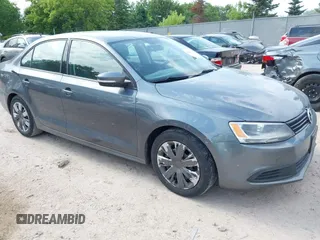 2014 Volkswagen Jetta SE with VIN 3VWD17AJ3EM228011, listed as a IAAI auction lot 42564182 with 123,824 mi miles and . Bid and sale history available at DreamBid. Image 1.