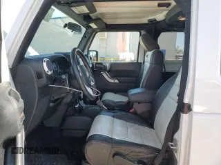 2012 Jeep Wrangler Arctic z VIN 1C4AJWBG4CL175580, wystawiony jako Copart lot #47866295 z przebiegiem 75 086 mil mil oraz Szkoda całkowita • Salvage title. Historia ofert i sprzedaży dostępna na DreamBid. Obrazek 7.