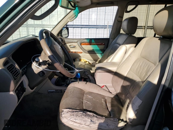 1999 Lexus LX 470 z VIN JT6HT00W0X0069481, wystawiony jako Copart lot #43588185 z przebiegiem 297 554 mil mil oraz Szkoda całkowita • Salvage title. Historia ofert i sprzedaży dostępna na DreamBid. Obrazek 7.