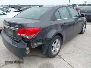 2015 Chevrolet Cruze LT with VIN 1G1PC5SB1F7299766, listed as a IAAI auction lot 42174921 with 131,308 mi miles and . Bid and sale history available at DreamBid. Image 4.