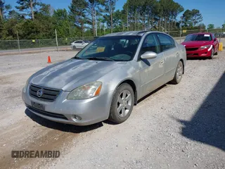 2002 Nissan Altima S with VIN 1N4AL11D12C166490, listed as a IAAI auction lot 42056634 with 203,367 mi miles. Bid and sale history available at carsss.com. Image 2.
