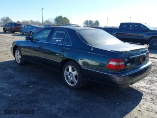 2000 Infiniti Q45 with VIN JNKBY31A7YM301457, listed as a IAAI auction lot 41583825 with 174,265 mi miles. Bid and sale history available at carsss.com. Image 3.