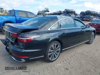 2022 Audi A8 with VIN WAULDAF87NN001657, listed as a IAAI auction lot 41515638 with 22,377 mi miles. Bid and sale history available at carsss.com. Image 4.
