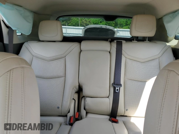 2017 Cadillac XT5 Luxury FWD с VIN 1GYKNBRS0HZ150007, выставлен на аукционе Copart как лот 54745505 с пробегом 37 271 миль миль и Списание • Salvage title. История ставок и продаж доступна на DreamBid. Изображение 10.