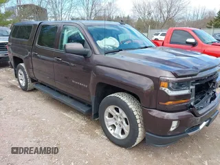 2016 Chevrolet Silverado 1500 LT with VIN 3GCUKREC3GG305792, listed as a IAAI auction lot 42083847 with 72,325 mi miles and . Bid and sale history available at DreamBid. Image 1.