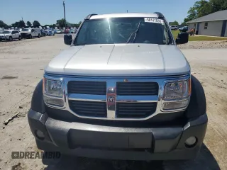 2007 Dodge Nitro SXT z VIN 1D8GT28K97W595592, wystawiony jako Copart lot #58141035 z przebiegiem 149 107 mil mil oraz Czysty tytuł • Clean title. Historia ofert i sprzedaży dostępna na DreamBid. Obrazek 5.