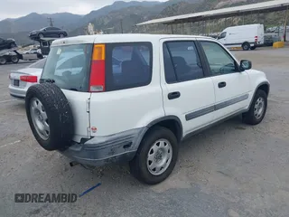 2000 Honda CR-V LX with VIN JHLRD2844YS000620, listed as a IAAI auction lot 42081400 with 259,781 mi miles. Bid and sale history available at carsss.com. Image 4.