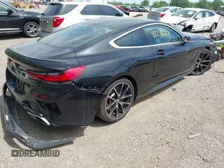 2019 BMW 8 Series M850i xDrive with VIN WBABC4C59KBU96788, listed as a IAAI auction lot 42286659 with 26,913 mi miles and . Bid and sale history available at DreamBid. Image 4.