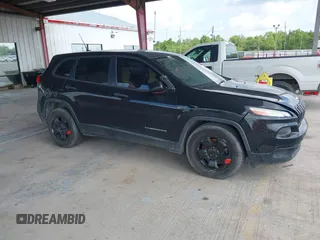 2015 Jeep Cherokee Sport with VIN 1C4PJLAB2FW539397, listed as a IAAI auction lot 42156576 with 120,409 mi miles. Bid and sale history available at carsss.com. Image 13.
