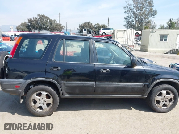 1999 Honda CR-V LX with VIN JHLRD2844XC011920, listed as a IAAI auction lot 41820203 with 224,967 mi miles. Bid and sale history available at carsss.com. Image 14.