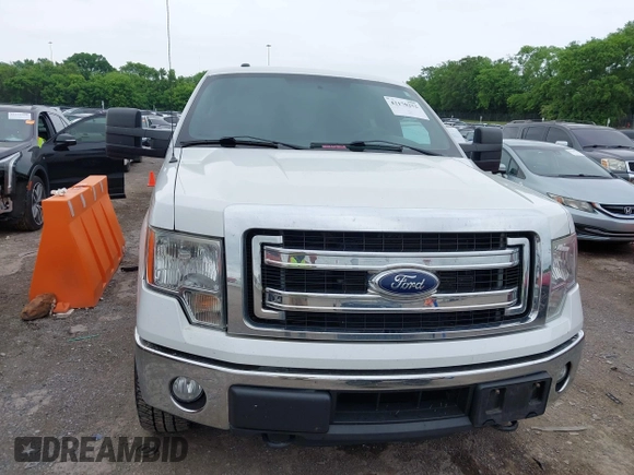 2014 Ford F-150 XL with VIN 1FTFW1ET8EFB33627, listed as a IAAI auction lot 42170252 with 173,886 mi miles. Bid and sale history available at carsss.com. Image 6.