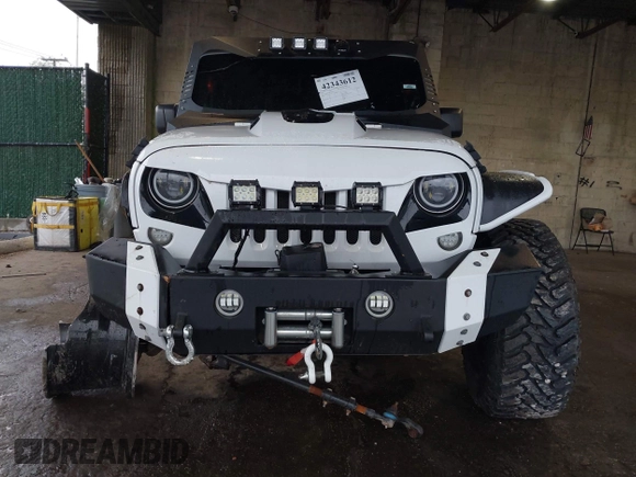 2012 Jeep Wrangler Unlimited Sport с VIN 1C4BJWDG8CL183831, выставлен на аукционе IAAI как лот 42343612 с пробегом 166 847 миль миль и . История ставок и продаж доступна на DreamBid. Изображение 6.