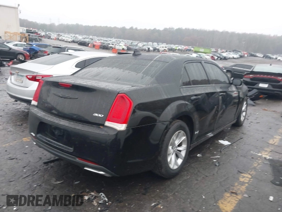 2015 Chrysler 300 Limited with VIN 2C3CCAAG8FH807168, listed as a IAAI auction lot 41056399 with Not Provided miles. Bid and sale history available at carsss.com. Image 4.