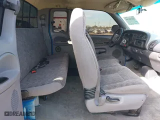 1999 Dodge Ram 1500 with VIN 3B7HC13Z2XG197088, listed as a IAAI auction lot 41686269 with 210,662 mi miles. Bid and sale history available at carsss.com. Image 8.