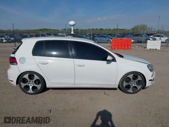 2013 Volkswagen Golf TDI z VIN WVWDM7AJ9DW138502, wystawiony jako IAAI lot #42115604 z przebiegiem 133 888 mil mil oraz . Historia ofert i sprzedaży dostępna na DreamBid. Obrazek 14.