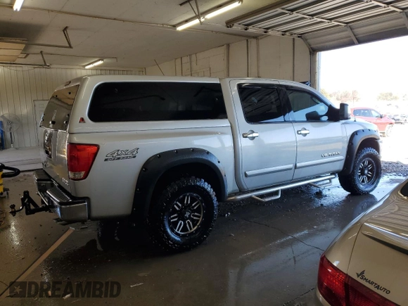 2005 Nissan Titan LE with VIN 1N6AA07B25N505392, listed as a Copart auction lot 50221945 with 187,780 mi miles and Salvage Title. Bid and sale history available at carsss.com. Image 3.