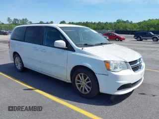 2016 Dodge Grand Caravan SXT with VIN 2C4RDGCG5GR396147, listed as a IAAI auction lot 42047166 with 166,785 mi miles. Bid and sale history available at carsss.com. Image 1.