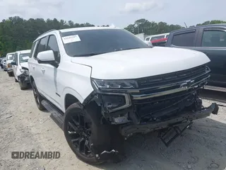2022 Chevrolet Tahoe RST with VIN 1GNSKRKT0NR136931, listed as a IAAI auction lot 42225397 with 75,243 mi miles and . Bid and sale history available at DreamBid. Image 1.