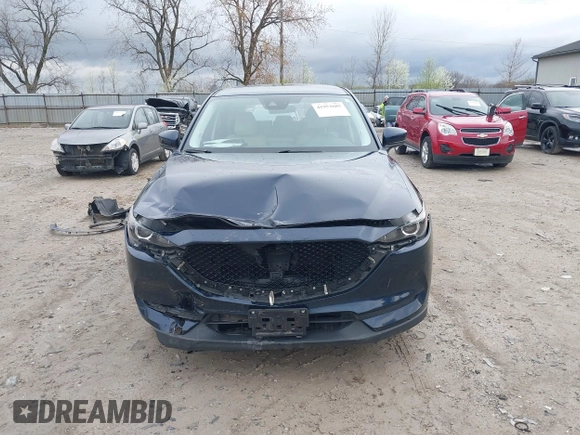 2017 Mazda CX-5 Touring with VIN JM3KFBCL7H0120552, listed as a IAAI auction lot 41953685 with 88,416 mi miles. Bid and sale history available at carsss.com. Image 13.