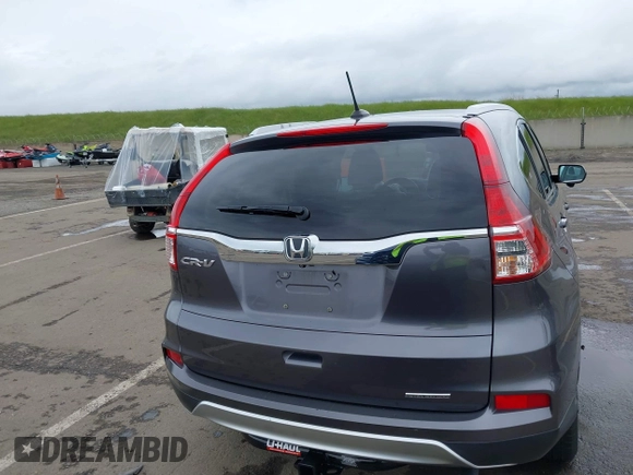 2015 Honda CR-V EX-L with VIN 2HKRM3H71FH540967, listed as a IAAI auction lot 41934678 with 74,206 mi miles. Bid and sale history available at carsss.com. Image 16.