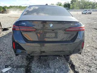 2024 BMW i5 eDrive40 with VIN WBY33FK04RCR49355, listed as a Copart auction lot 55828475 with Not Provided miles and Salvage Title. Bid and sale history available at DreamBid. Image 6.