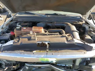 2003 Ford Super Duty F-250 XL with VIN 1FTNX21L83EB37779, listed as a Copart auction lot 77220014 with 160,011 mi miles and Salvage Title. Bid and sale history available at carsss.com. Image 11.