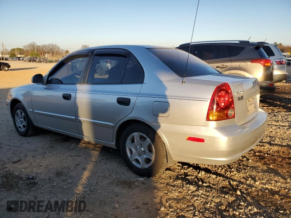 2003 Hyundai Accent GL with VIN KMHCG45C93U496038, listed as a Copart auction lot 87260904 with 104,251 mi miles and Salvage Title. Bid and sale history available at carsss.com. Image 2.