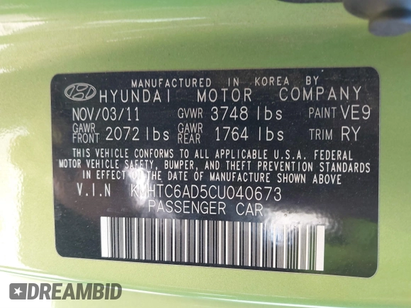 2012 Hyundai Veloster w/Gray Int z VIN KMHTC6AD5CU040673, wystawiony jako IAAI lot #41491429 z przebiegiem Nie podano mil oraz . Historia ofert i sprzedaży dostępna na DreamBid. Obrazek 9.