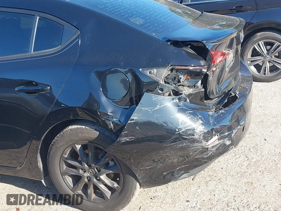 2015 Mazda Mazda3 i Touring with VIN 3MZBM1V73FM207770, listed as a IAAI auction lot 41749926 with 106,522 mi miles. Bid and sale history available at carsss.com. Image 18.