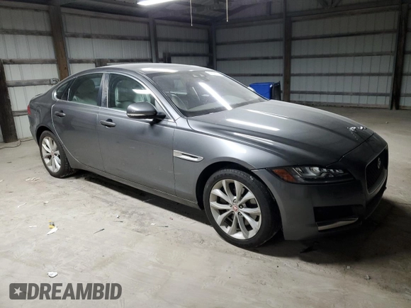 2017 Jaguar XF with VIN SAJBJ4BN3HCY42655, listed as a Copart auction lot 87798165 with 80,700 mi miles and Salvage Title. Bid and sale history available at DreamBid. Image 4.