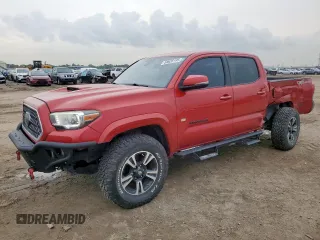 2018 Toyota Tacoma SR5 with VIN 3TMAZ5CN3JM071383, listed as a Copart auction lot 58628195 with 76,645 mi miles and Salvage title. Bid and sale history available at DreamBid. Image 1.