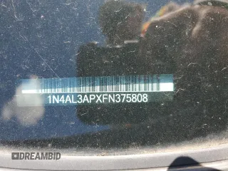 2015 Nissan Altima SL z VIN 1N4AL3APXFN375808, wystawiony jako Copart lot #56766335 z przebiegiem 110 588 mil mil oraz Szkoda całkowita • Salvage title. Historia ofert i sprzedaży dostępna na DreamBid. Obrazek 13.
