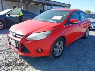 2012 Ford Focus SEL with VIN 1FAHP3M20CL393440, listed as a IAAI auction lot 42015692 with 198,214 mi miles. Bid and sale history available at carsss.com. Image 2.