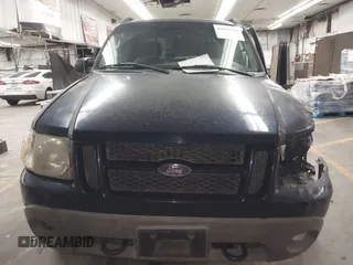 2003 Ford Explorer Sport Trac XLS z VIN 1FMDU77E03UC07089, wystawiony jako IAAI lot #41938966 z przebiegiem 128 982 mil mil oraz . Historia ofert i sprzedaży dostępna na DreamBid. Obrazek 12.
