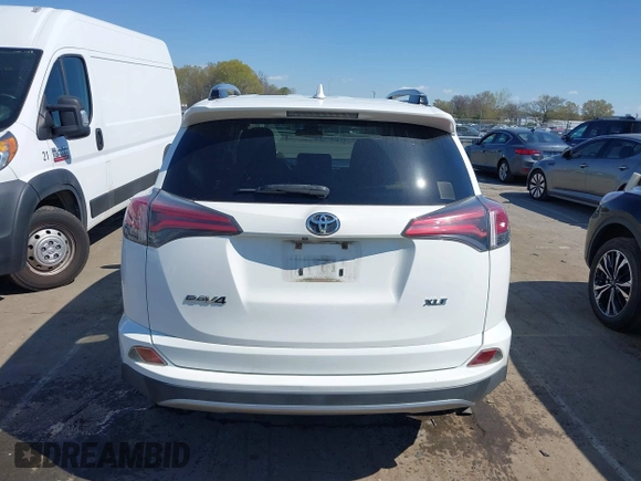 2017 Toyota RAV4 XLE with VIN JTMWFREV8HD107495, listed as a IAAI auction lot 41859546 with 150,503 mi miles and . Bid and sale history available at DreamBid. Image 16.