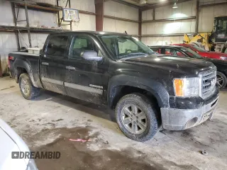 2012 GMC Sierra 1500 SLE with VIN 3GTP2VE72CG219554, listed as a Copart auction lot 47550635 with 154,365 mi miles and Salvage Title. Bid and sale history available at DreamBid. Image 4.