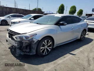 2018 Nissan Maxima SL with VIN 1N4AA6AP7JC392495, listed as a Copart auction lot 61052505 with 71,217 mi miles and Salvage title. Bid and sale history available at DreamBid. Image 1.